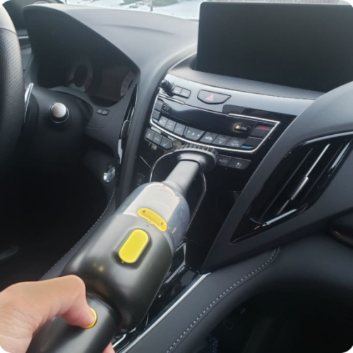 close up of cleaning car radio with Clean Jett